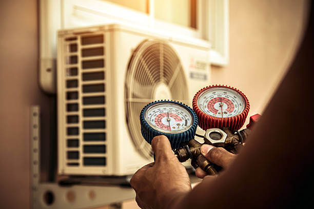 Professional Air Conditioning Service technician working in Newport Beach, CA